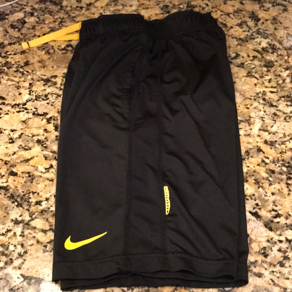 Boys Black Nike Live Strong shorts.